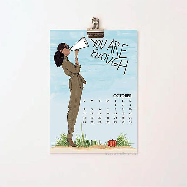 Expressions Calendar sheet for October with illustration of a woman holding a megaphone and text 'You Are Enough'
