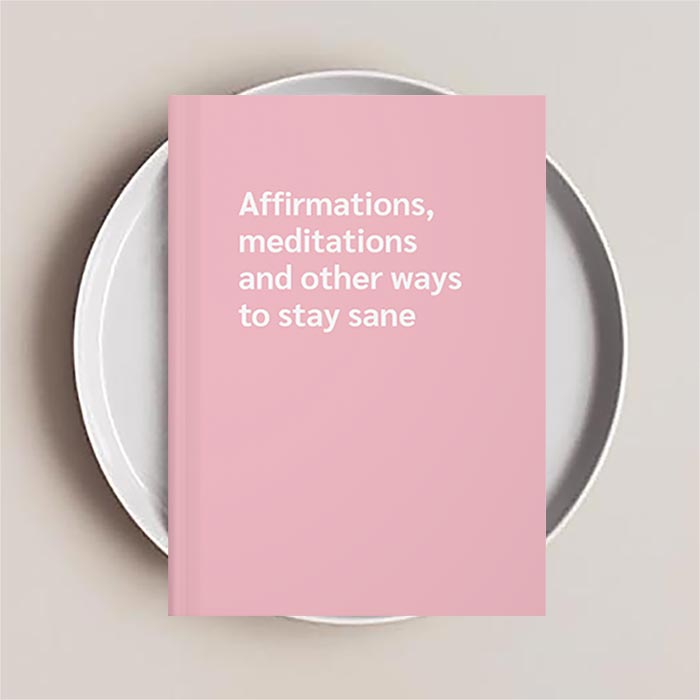 Pink journal notebook that reads 'Affirmations, meditations and other ways to stay sane' on the cover