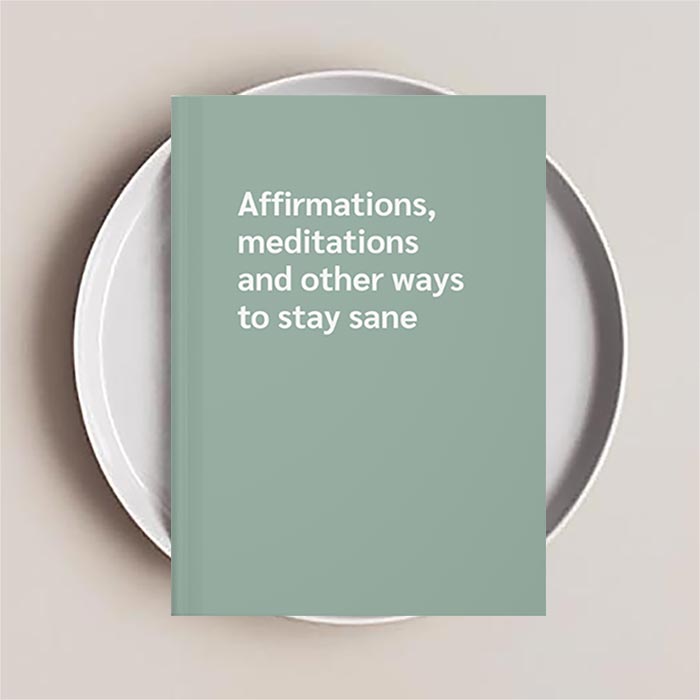 Journal notebook that reads 'Affirmations, meditations and other ways to stay sane' on the cover