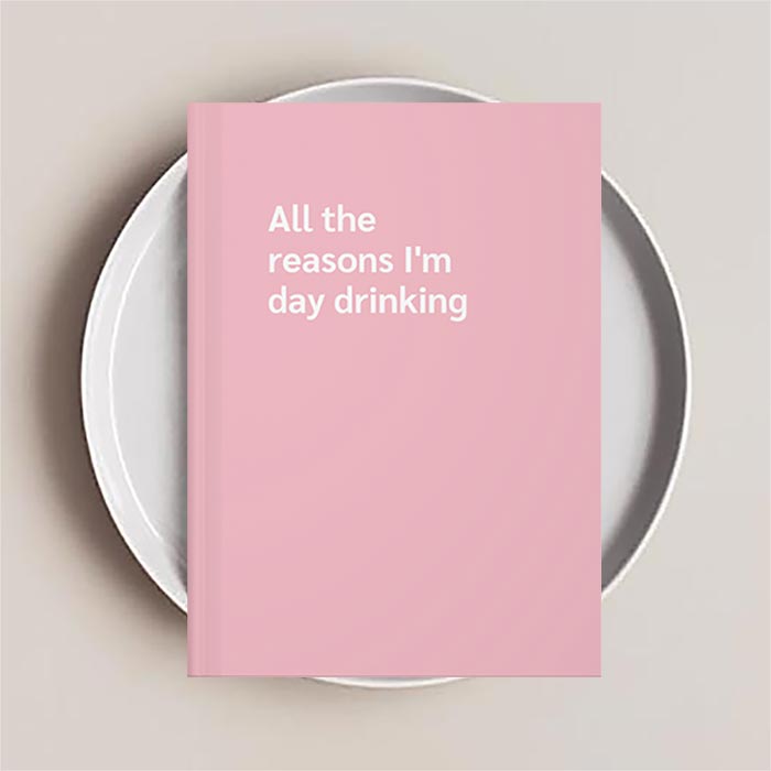 Journal notebook with the text 'All the reasons I'm day drinking' on the cover
