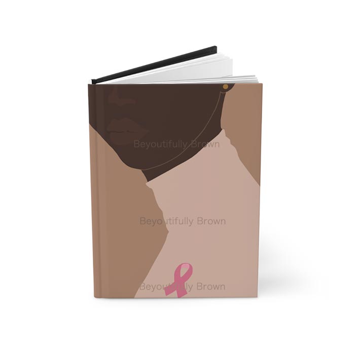 Journal Notebook with a pink ribbon design on the cover