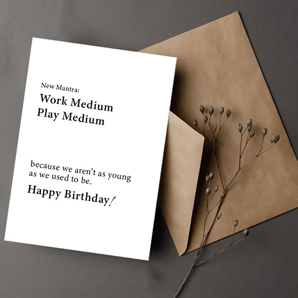 A funny birthday card with witty text and a brown envelope